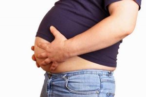 What causes an abdominal hernia, and how should it be treated?