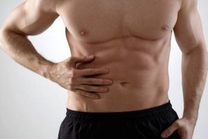 What causes an abdominal hernia, and how should it be treated?