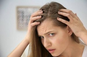 Cause and treatment of hair loss in women