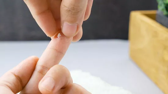 Immediate method of removing glue drop from the skin of the hand