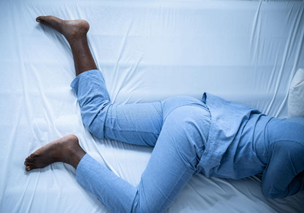 What causes restless leg syndrome to flare up